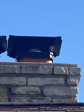 [Hearth.com] Minimum gap between top of flue and chimney cap