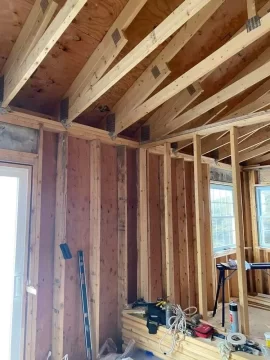 [Hearth.com] Wood stove roof joist problem