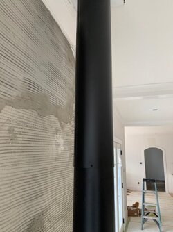 Question about exposed stove pipe on new install