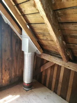 [Hearth.com] Boxing in around this wood stove chimney, second floor.  How far away does my framing need to be?