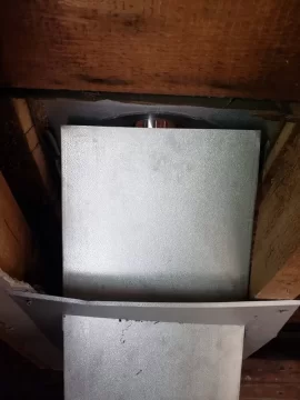 [Hearth.com] Boxing in around this wood stove chimney, second floor.  How far away does my framing need to be?