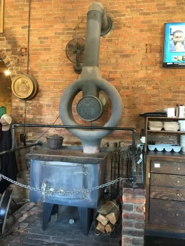 [Hearth.com] Old stove in a mining town tavern