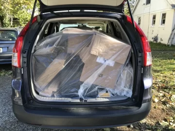 [Hearth.com] Jotul F400 How to transport home in SUV, with your Dog, for a 5 Hour Trip.