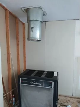 [Hearth.com] Installing new chimney and stove pipe to wonderluxe stove.