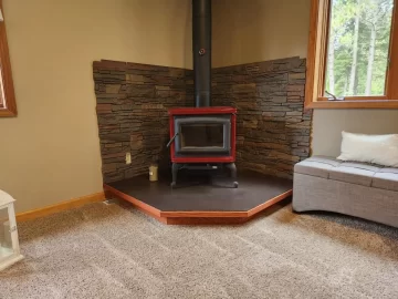 [Hearth.com] Corner mantel for free standing woodstove