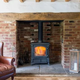 [Hearth.com] Inefficient to put wood stove into a sealed fireplace?