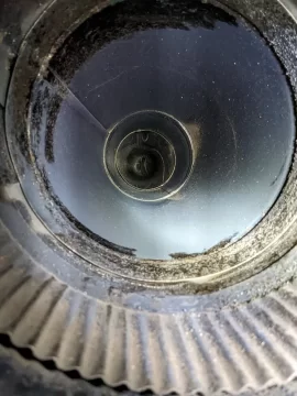 [Hearth.com] Yet another hair raising moment with my new stove. Plastic smell and tinging inside the pipe.