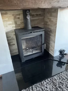 [Hearth.com] How to plug gap around flue pipe.. any suggestions please?