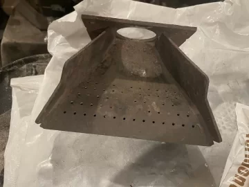 [Hearth.com] Cleaning up a Harman pellet stove burnpot with white aluminum oxide.