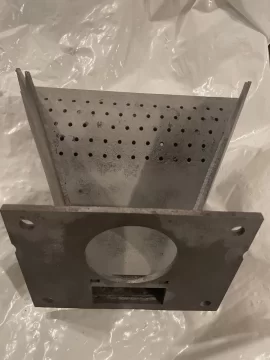 [Hearth.com] Cleaning up a Harman pellet stove burnpot with white aluminum oxide.