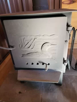 [Hearth.com] Please help identify stove with loon relief design on door