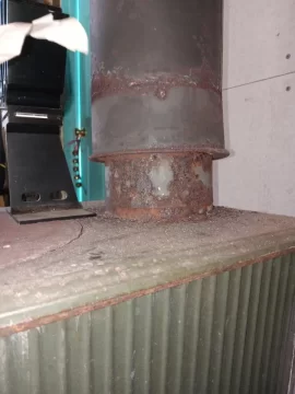 [Hearth.com] Gap between wood stove/single wall chimney