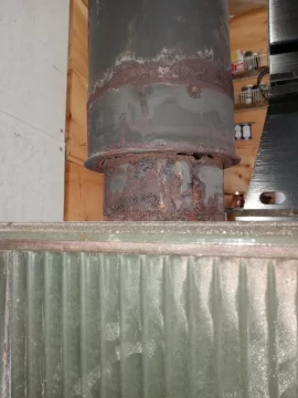 [Hearth.com] Gap between wood stove/single wall chimney