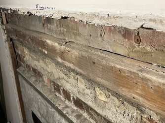 attaching wood to brick surround for cement board