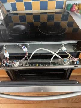 [Hearth.com] Replacing the heating element in a glass top electric kitchen stove - not like the old days!