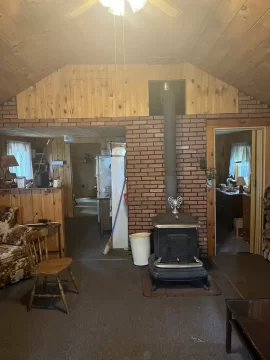 [Hearth.com] Relocate newer stove to corner or stay in original location?