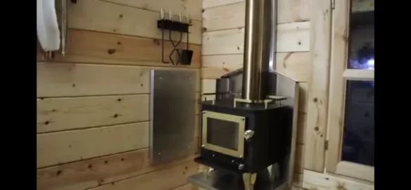 [Hearth.com] What kind of wood stove is in this new bunkie cabin bedroom?