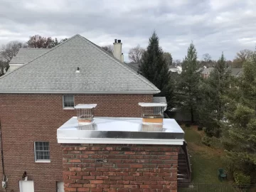 [Hearth.com] Cement Crown Chimney vs Stainless Steel Chimney