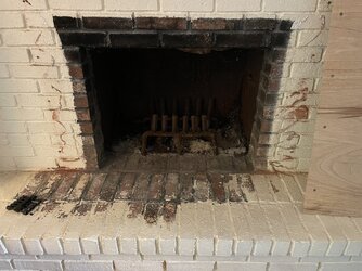 Remove rotted steel firebox or can it support a wood stove insert?