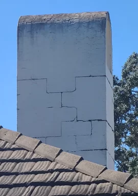 [Hearth.com] Chimney cinder blocks appearing through stucco