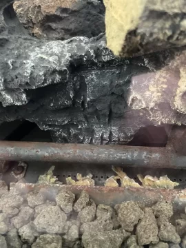 [Hearth.com] Fireplace Melted