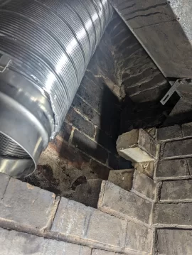 [Hearth.com] Insulated flex liner installation and rock wool