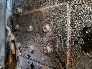 [Hearth.com] Bolted-on metal repair to cast iron stove (Dutchwest 2462)