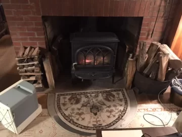 [Hearth.com] Wood stove within (not in front of) existing fireplace?