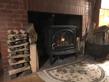 [Hearth.com] How much wood is appropriate in huge masonry fireplace?