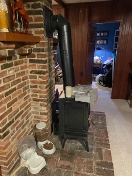 [Hearth.com] Section of stove pipe out of Stove and into chimney flue