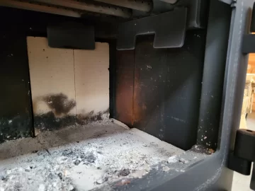 [Hearth.com] Question concerning rust dust inside wood stove after 1 week?