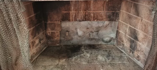 [Hearth.com] Repairing cracked firebox mortar and bricks.