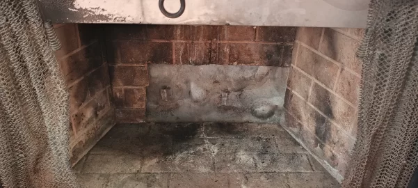 [Hearth.com] Repairing cracked firebox mortar and bricks.