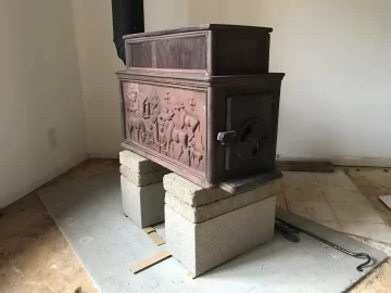 [Hearth.com] wood stoves up on bricks