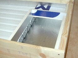 A standalone dual-pass solar air heater using downspouts