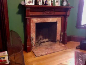 [Hearth.com] Need help for meeting clearances in small fireplace - can I make a stove happen in 2012?!?!?!