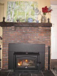 Painting the brick of a fireplace with an insert