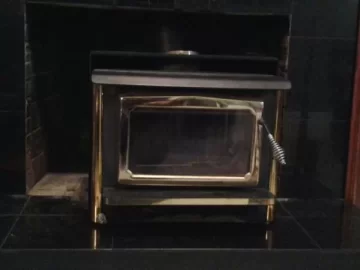 [Hearth.com] Looking for a stove ID on this Osburn.  Is it EPA approved?