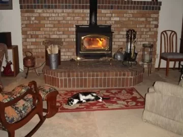 [Hearth.com] Significant heating difference between woodstove as insert or freestanding?