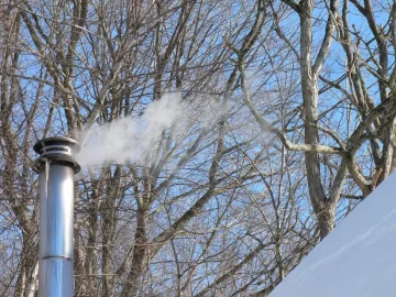 [Hearth.com] Wet Wood? Icicles and no gasification.