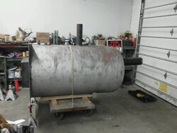 Building an outside wood boiler from old propane tanks.