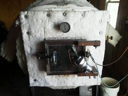 Building an outside wood boiler from old propane tanks.