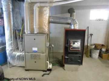 [Hearth.com] Gas furnace with auxiliary wood burner (pic)