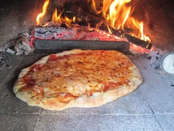 [Hearth.com] Wood fire oven chasing away a chilly day.  The usual food content warning.