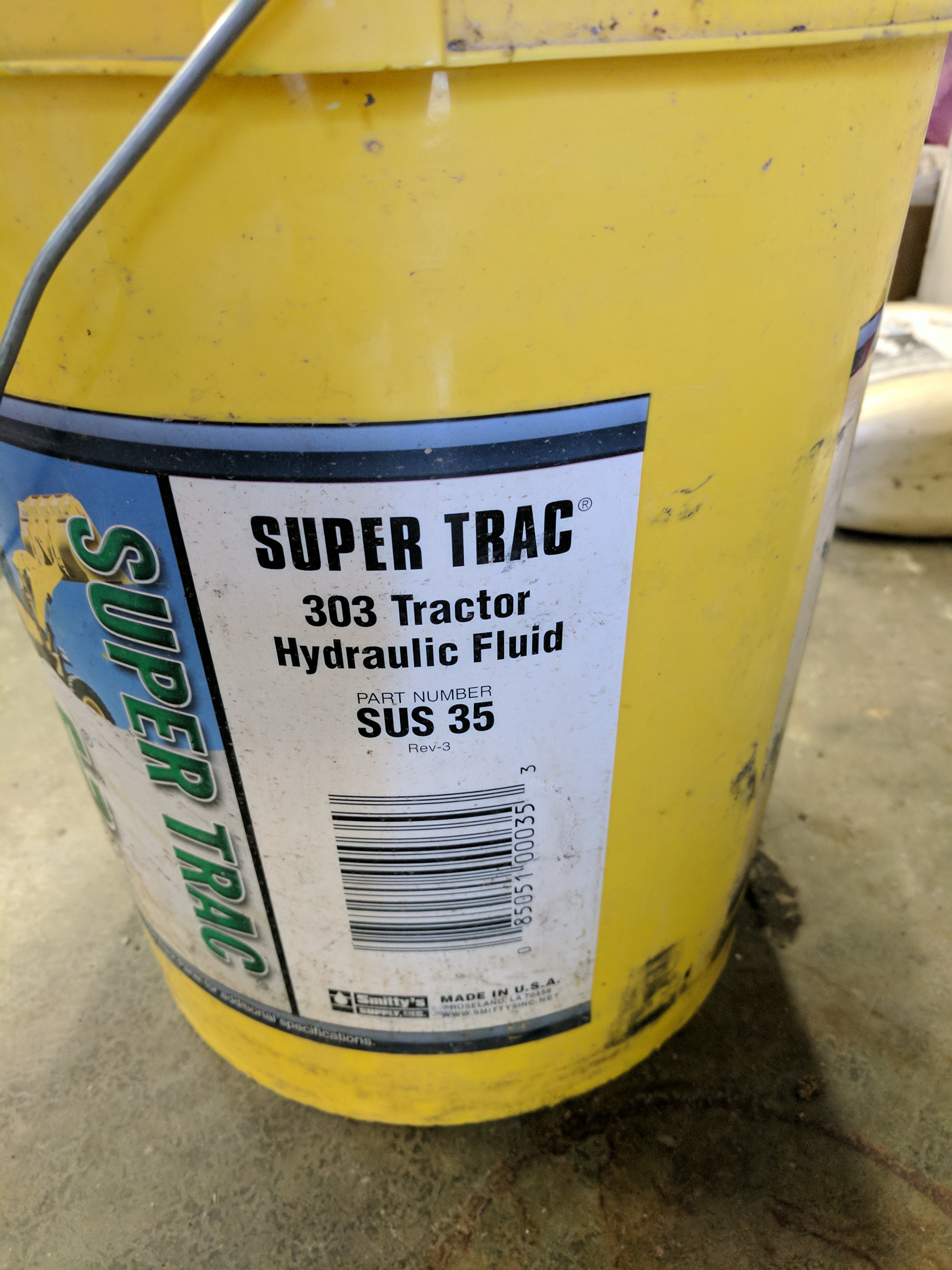 303 tractor hydraulic fluid in splitter?